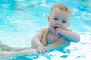 Baby in a pool with water - Indoor Swimming Pool for Babies Swimming Lessons